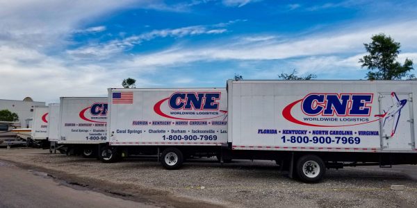 CNE Worldwide Logistics trucks lined up at their facility, ready for efficient and reliable transportation.