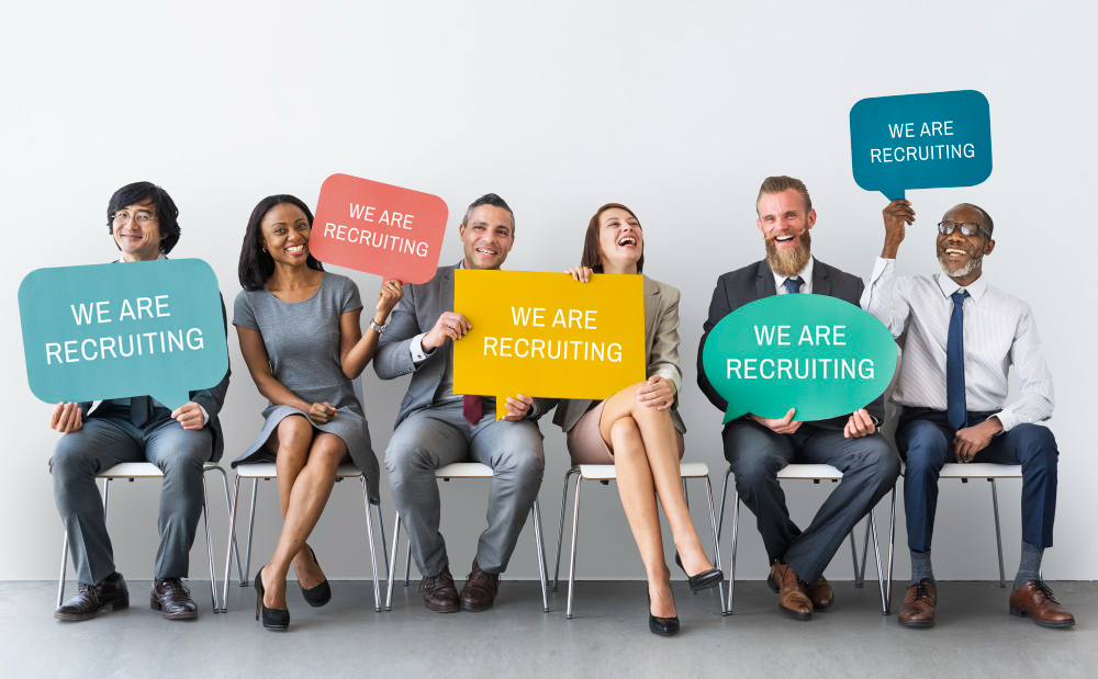 Diverse group of candidates collaborating in a modern workspace