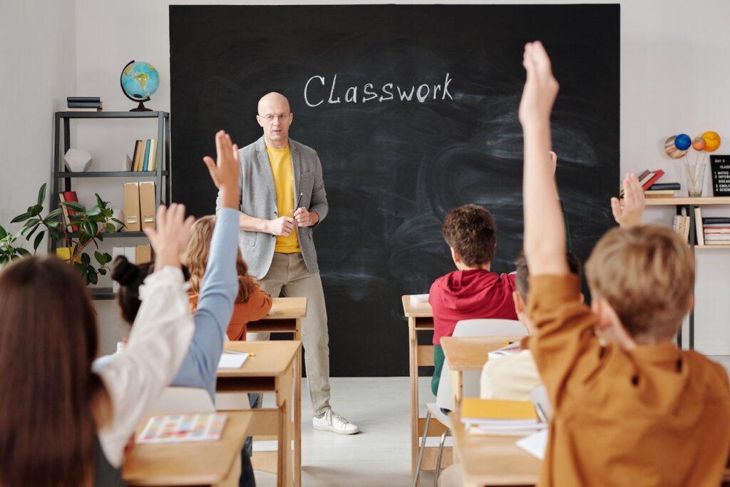 Teacher in a classroom, exemplifying the core of education recruitment and hiring