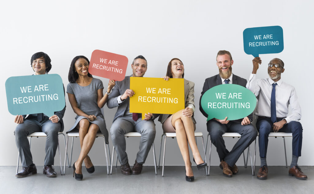 Coworkers posing for a recruitment advertising campaign.