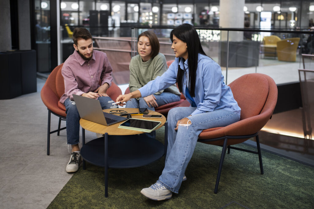 Gen Z employees collaborating in an office.