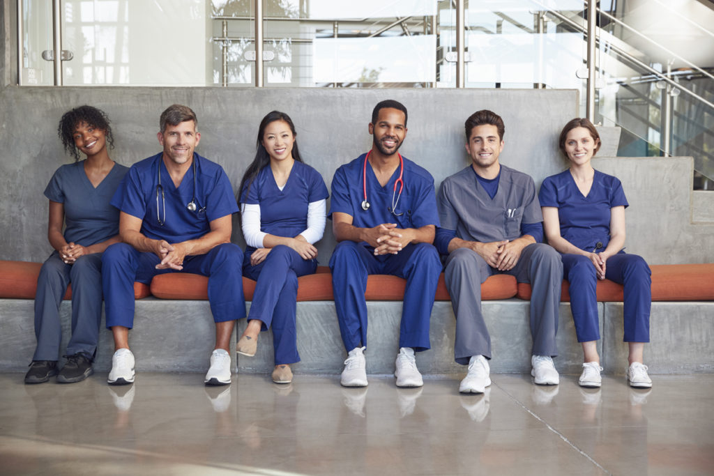 Group of new nurses on first day, symbolizing success in how to recruit nurses