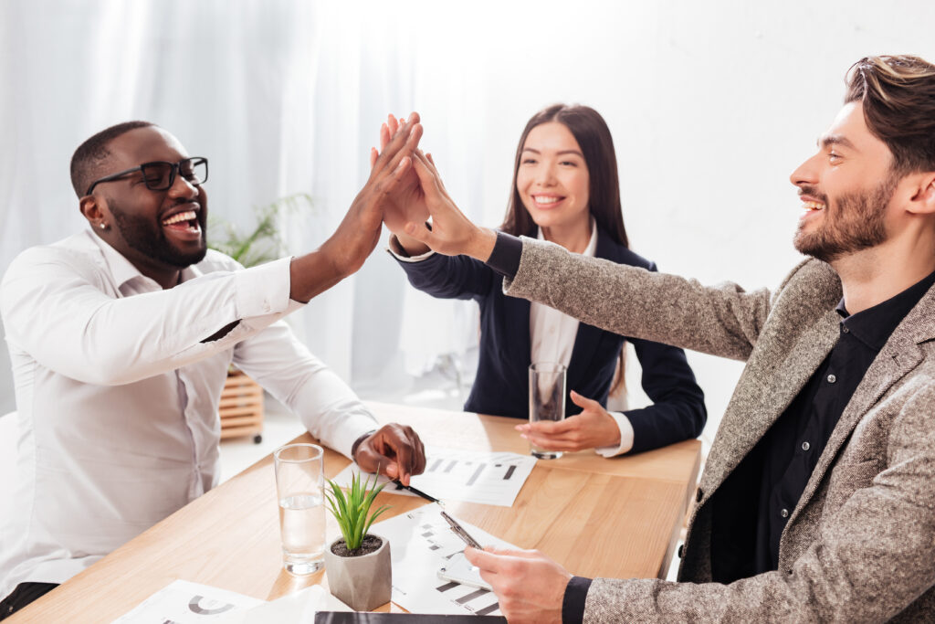 Team of recruiters in a meeting discussing 2023 recruitment goals